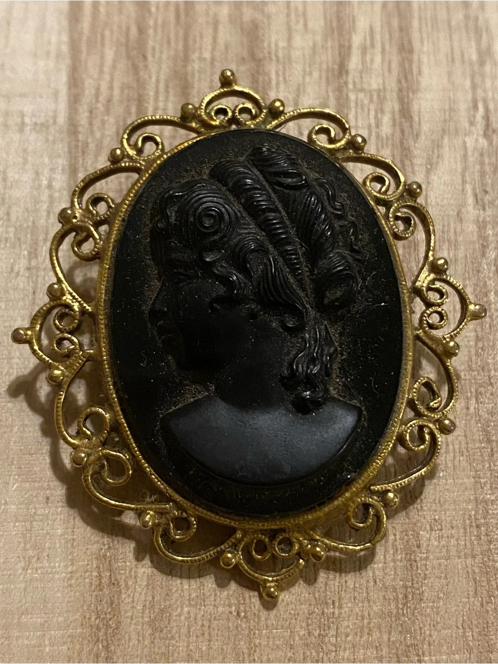 Vintage Black Cameo Brooch with Gold Tone Ornate Frame